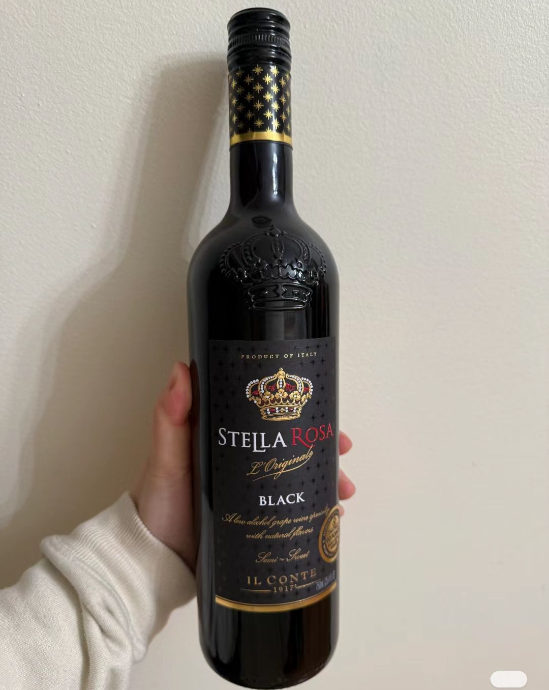 sweet berry wine​ with a Tart, Lingering Bite